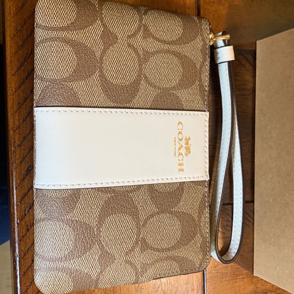 Coach wristlet in original gift wrapping